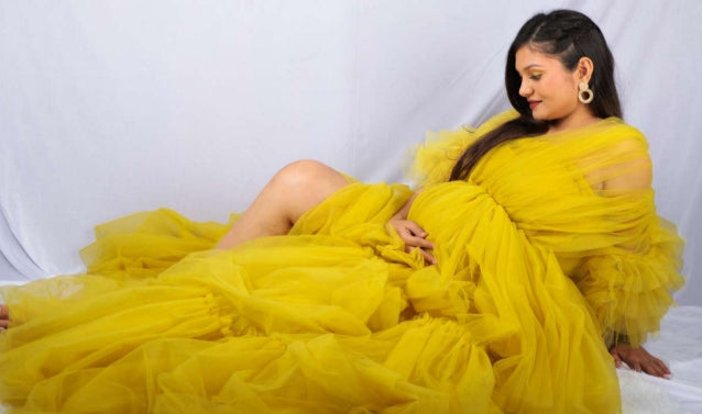 Golden Glow: The Enchanting Maternity Gown